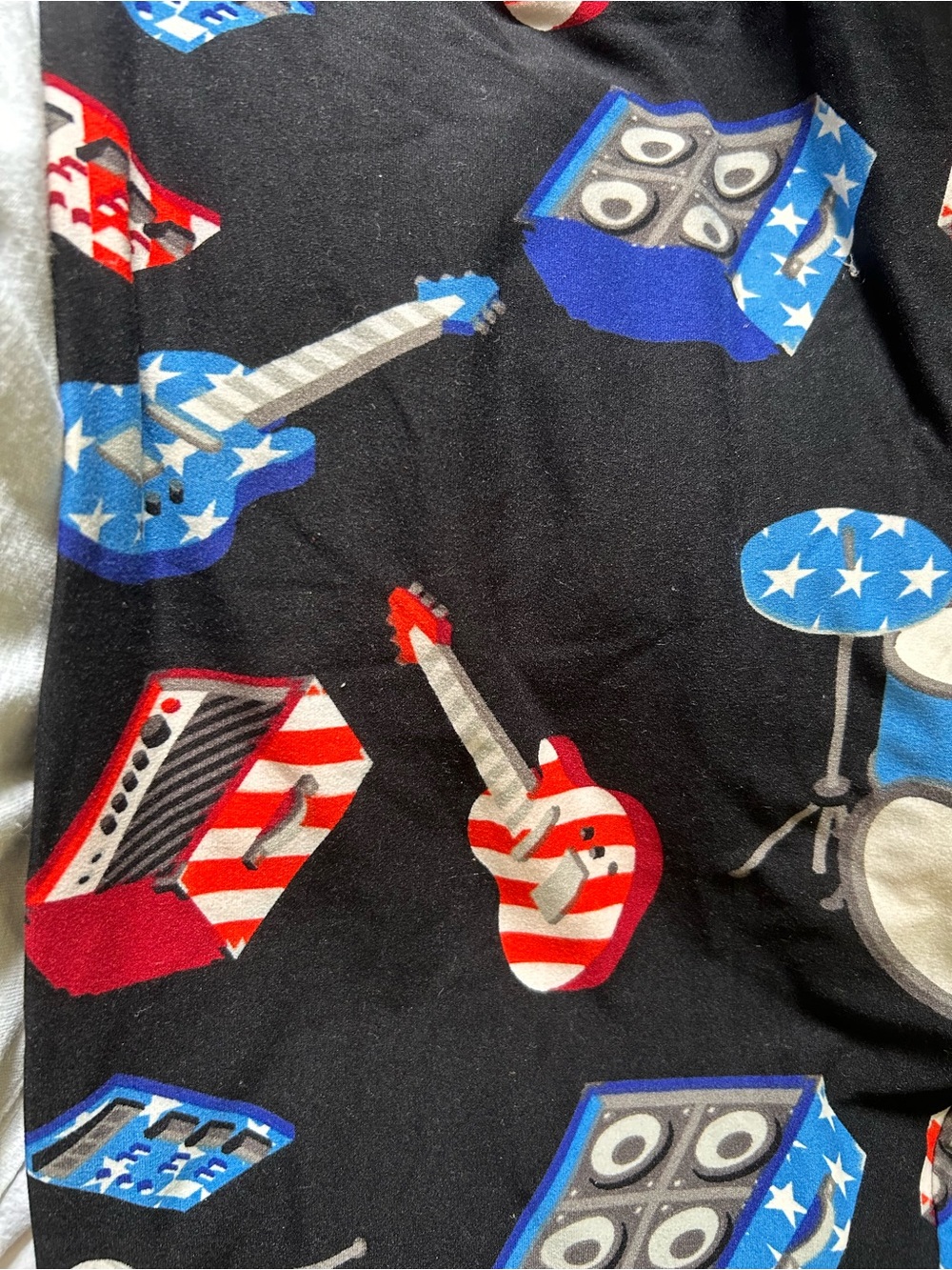 LuLaRoe Black Leggings with Red, White & Blue Guitar and Drum Print